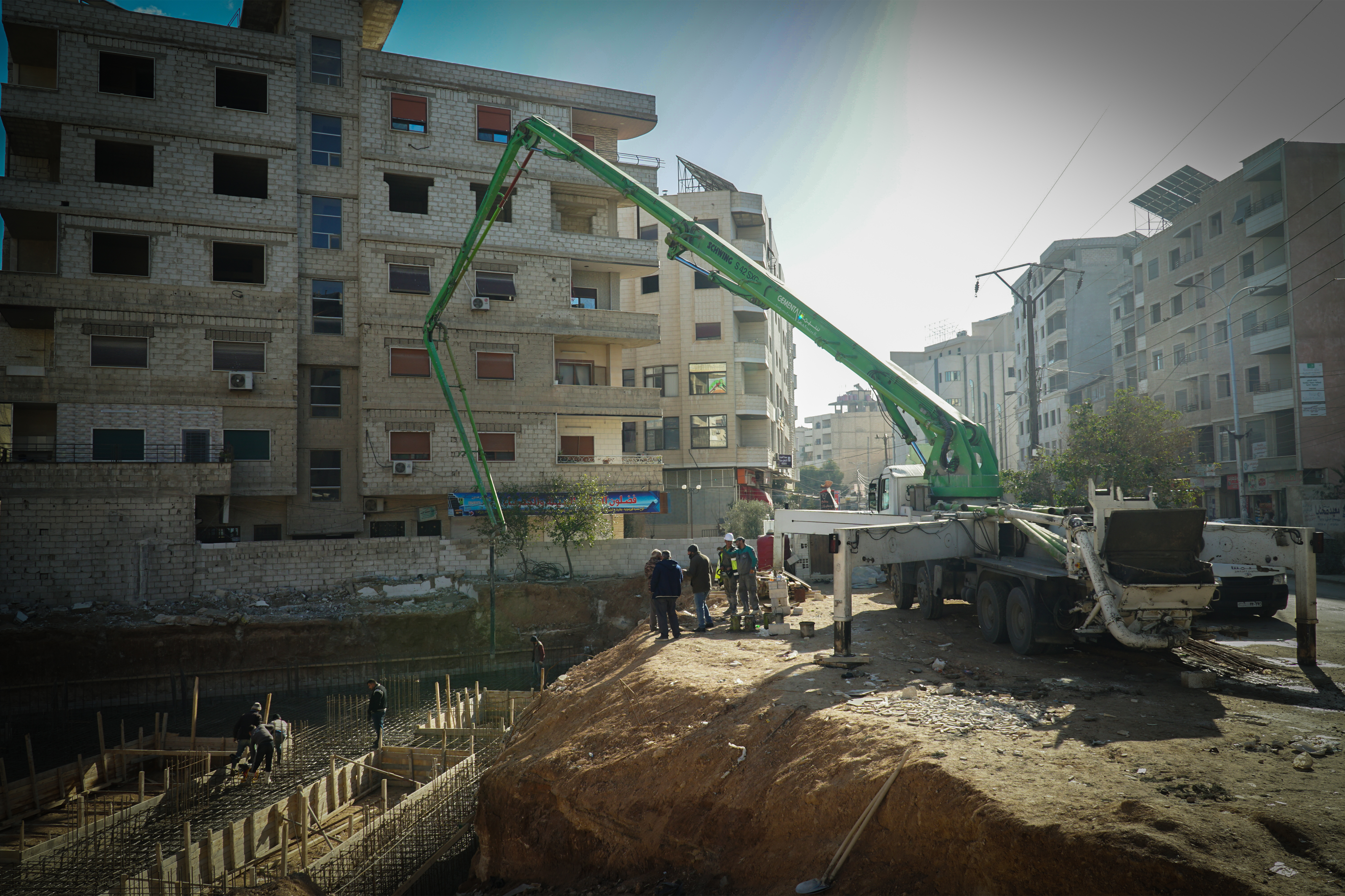 Concrete pump in construction zone